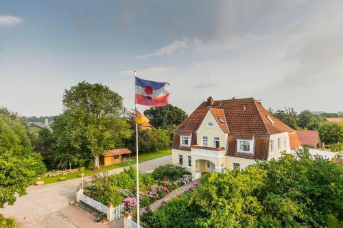 Фотографии гостевого дома 
            Altes-Landhaus-Ferienwohnung-Schleswig-Holstein