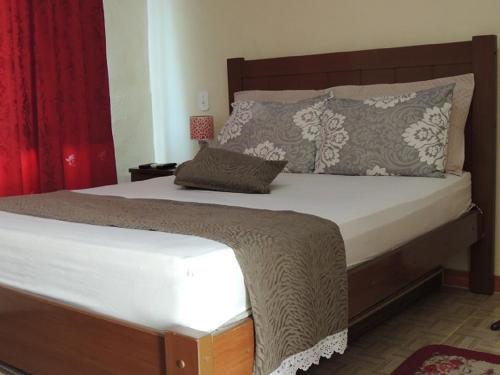 Фотография мини отеля Quartos Em Casa Caxias - Pousada Paraíso