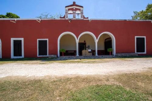 Фотографии гостиницы 
            Capital O Hotel Hacienda Yunku