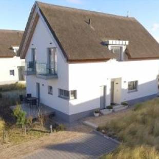 Фотографии гостевого дома 
            Ostsee - Reetdachhaus "Graswarder" im Strand Resort