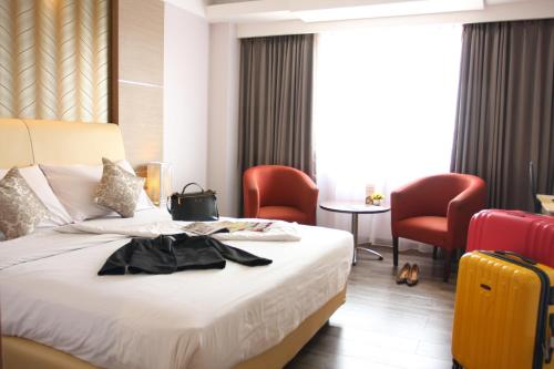 Фотография гостиницы Orchardz Hotel Industri Jakarta