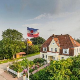 Фотография гостевого дома Altes-Landhaus-Ferienwohnung-Schleswig-Holstein