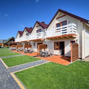 Фотографии гостевого дома
Piasek i Woda Domki