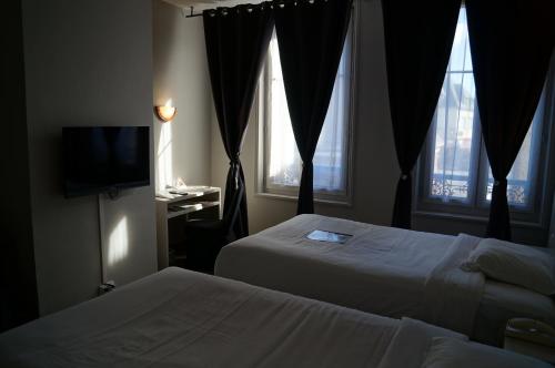 Фотография гостиницы Brit Hotel Du Dauphin L'Aigle