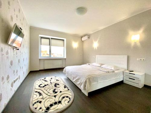 Фотографии квартиры 
            Шикарные 2-комнатные апартаменты, светлый, сдержанный дизайн