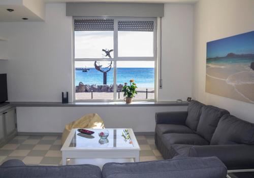 Фотография гостевого дома Duplex con vistas en primera linea de playa