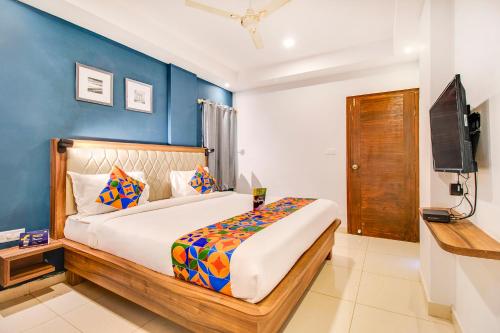 Фотографии гостиницы 
            FabHotel The Sun Suites Vinayaka Nagar