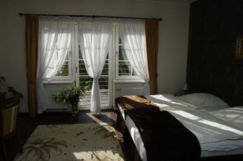 Фотография гостевого дома Pensjonat - Restauracja Żółty Domek