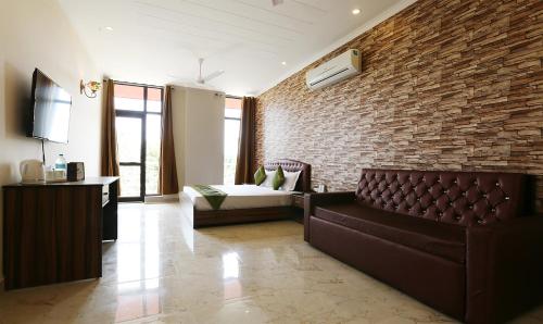 Фотография гостиницы Treebo Trend Blessing Bells Ballupur Chowk