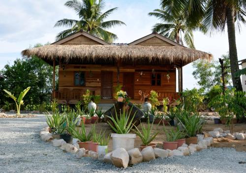 Фотография гостевого дома Fish Island Bungalows