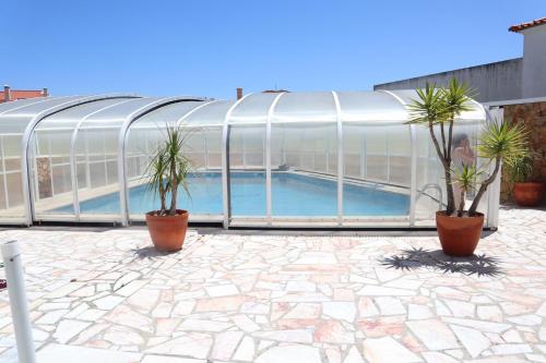 Фотография гостевого дома Dii Beach House Piscina Interior Aquecida