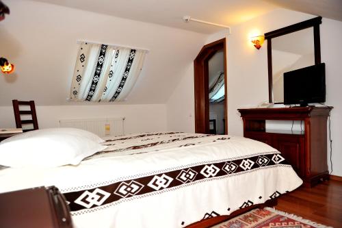 Фотография гостевого дома Pensiunea Casa Doamnei Voronet