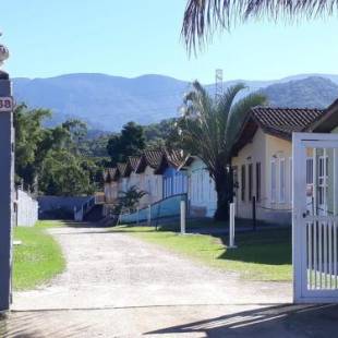 Фотографии гостиницы 
            ACESSO A PÉ A PRAIA DA MARANDUBA! Casa com 2 dormitórios em Condomínio e 3 vagas de garagem