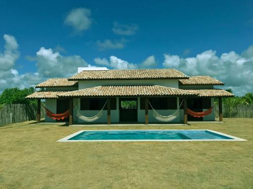 Фотографии гостевого дома 
            Casa Gaiuba - 2 suítes, Piscina na Rota Ecológica dos Milagres