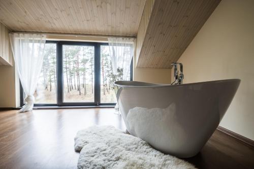 Фотография гостевого дома Jūras Krasti Romantika