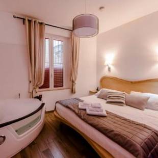 Фотографии гостевого дома 
            Flatinrome Trastevere Deluxe Rooms - Jacuzzi