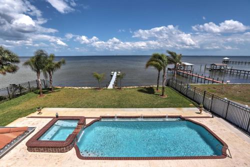 Фотографии гостевого дома 
            Riverfront Titusville Resort Home with Infinity Pool