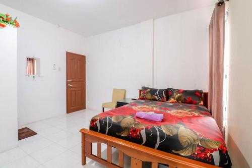 Фотография гостиницы OYO 90024 Botania Homestay & Cafe