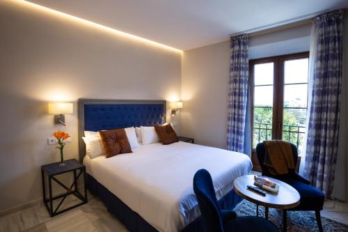 Фотография апарт отеля Plazuela del Carbón Suites