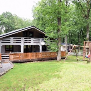 Фотография гостевого дома Beautiful, atmospheric and spacious chalet with sauna, open and covered terraces and garden