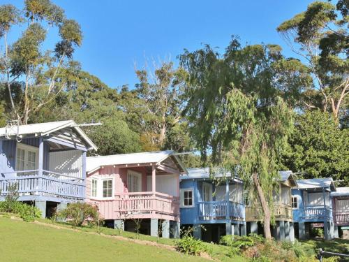 Фотографии гостевого дома 
            Cottage 3 Hyams Beach Seaside Cottages