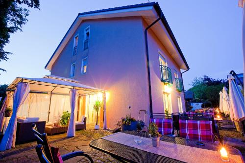 Фотография гостевого дома Gästehaus Guggenberger