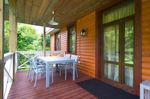 Фотография гостевого дома Домик у пруда. SPA Усадьба