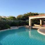 Фотография гостевого дома Villa de 4 chambres a Corbara a 20 m de la plage avec vue sur la mer piscine privee et jacuzzy