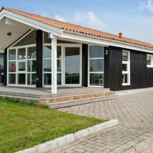 Фотографии гостевого дома 
            Holiday home Rønde