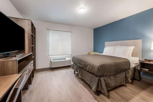 Фотографии гостиницы 
            WoodSpring Suites Charlotte - University Research Park