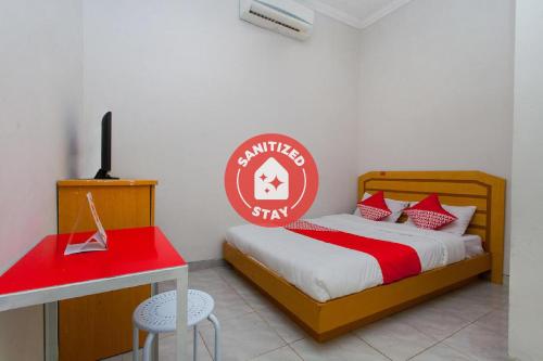 Фотографии гостиницы 
            OYO 3060 Al Fatih Guest House Syariah