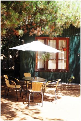 Фотография гостевого дома Cabañas La Magia de Isla Negra