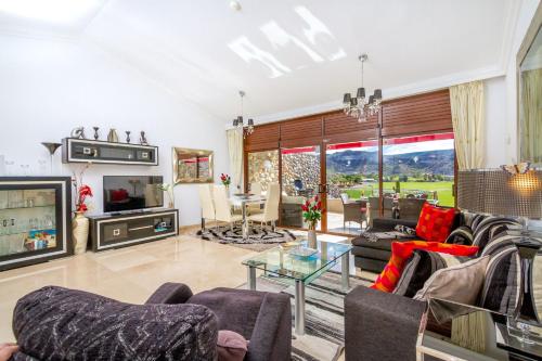 Фотография гостевого дома Casa Holmston, Duplex villa with hot tub in Anfi Tauro Topaz