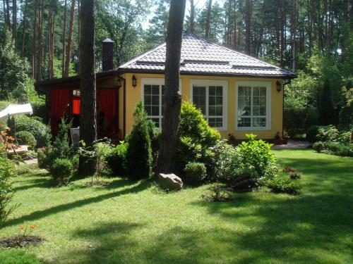 Фотография гостевого дома Домик в лесу