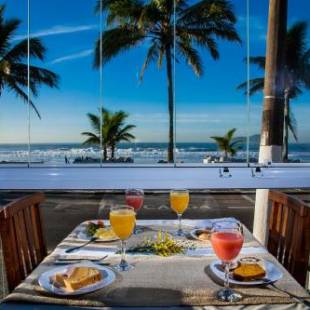 Фотографии гостиницы 
            Strand Hotel Guarujá Frente Mar