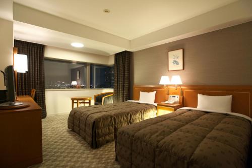 Фотография гостиницы Toshi Center Hotel