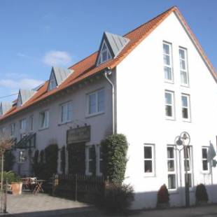 Фотографии гостиницы 
            Hotel Gasthof Grüner Wald