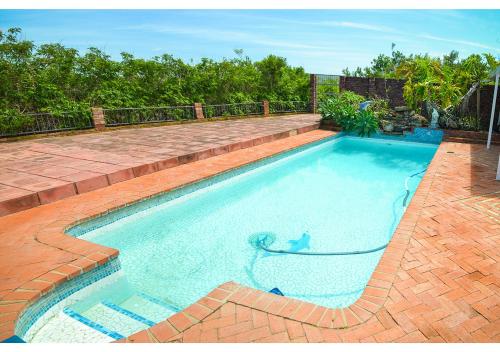 Фотография гостевого дома Addo Park View - Sundaze Riverside