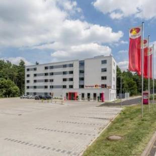 Фотографии гостиницы 
            Serways Hotel Weiskirchen Nord