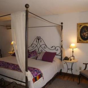 Фотографии гостиницы 
            Hotel Casa Rosada - Adults Only