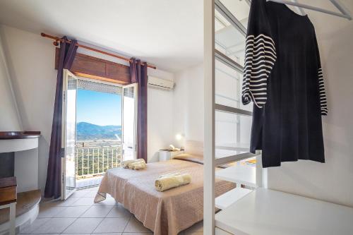 Фотография гостевого дома bedbike Baunei