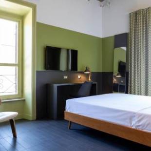 Фотографии гостевого дома 
            MODO Rooms & Suite Rome