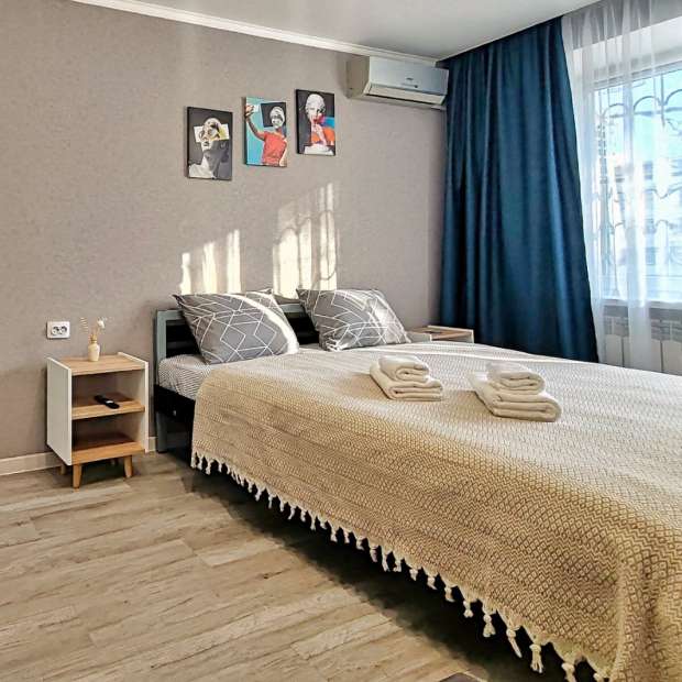 Фотография квартиры Уютно - и точка на Мира с парящей кроватью