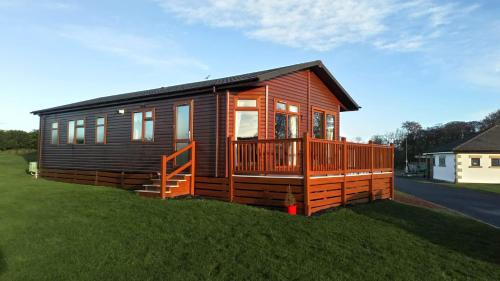 Фотография гостевого дома Mildreds Lodge with Hot Tub