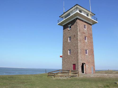 Фотографии гостевого дома 
            Heritage Coast Guard Station Holiday Home in Huisduinen