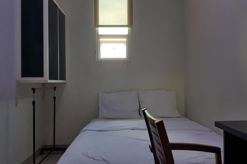 Фотография гостиницы OYO 3838 Tamansari Guest House