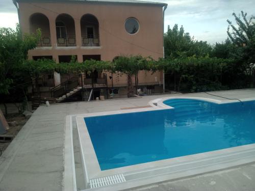 Фотография гостевого дома Villa with pool Saguramo garden