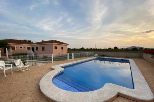 Фотографии гостевого дома 
            Villa Dolores, un chalet con piscina y barbacoa en la huerta del Segura.