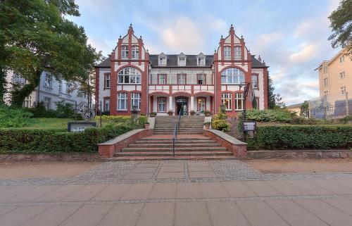 Фотография мини отеля Strandhotel garni Kormoran