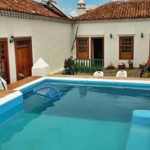 Фотографии гостевого дома 
            2 bedrooms house with shared pool and wifi at San Cristobal de La Laguna